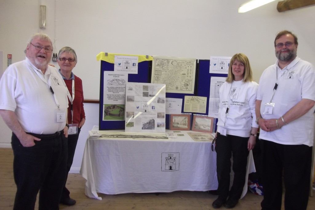 Some of our volunteers posing in front of the main table